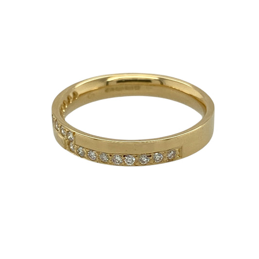 Add refined sparkle and timeless elegance to your collection with this pre-owned 18ct yellow gold diamond set band ring—an effortlessly stylish piece with classic appeal.

Design: The ring features a slim band measuring approximately 3mm at the front, set with sparkling diamonds that create a bright and elegant finish.
Material: Made from 18-carat yellow gold, the polished finish enhances the rich warmth of the metal while complementing the brilliance of the diamonds.