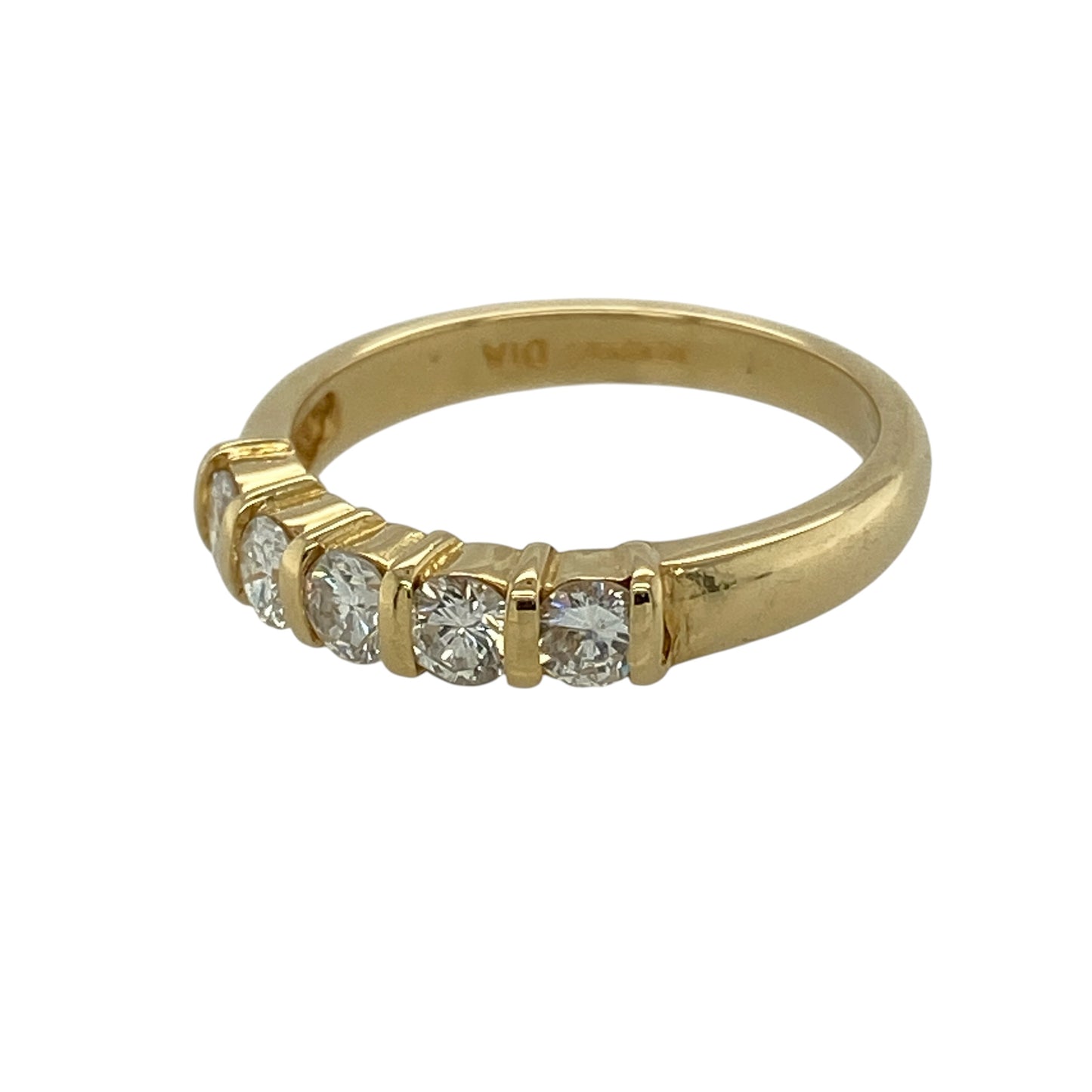 Add timeless brilliance and classic elegance to your collection with this pre-owned 18ct yellow gold diamond set five stone band ring—an eye-catching piece with enduring appeal.

Design: The ring features five brilliant-cut diamonds, beautifully arranged across the band to create a balanced and continuous display of sparkle, with approximately 0.51ct total diamond content.