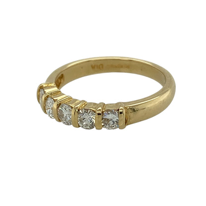 Add timeless brilliance and classic elegance to your collection with this pre-owned 18ct yellow gold diamond set five stone band ring—an eye-catching piece with enduring appeal.

Design: The ring features five brilliant-cut diamonds, beautifully arranged across the band to create a balanced and continuous display of sparkle, with approximately 0.51ct total diamond content.
