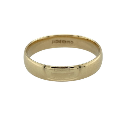 Celebrate timeless simplicity with this pre-owned 9ct yellow gold 4mm wedding band ring—an elegant and classic piece designed for everyday wear.

Design: The ring features a traditional band measuring approximately 4mm in width, offering a smooth and clean profile with a slightly bolder presence than slimmer bands.
Material: Made from 9-carat yellow gold, the polished finish enhances the warm tone of the metal and gives a refined, classic shine.