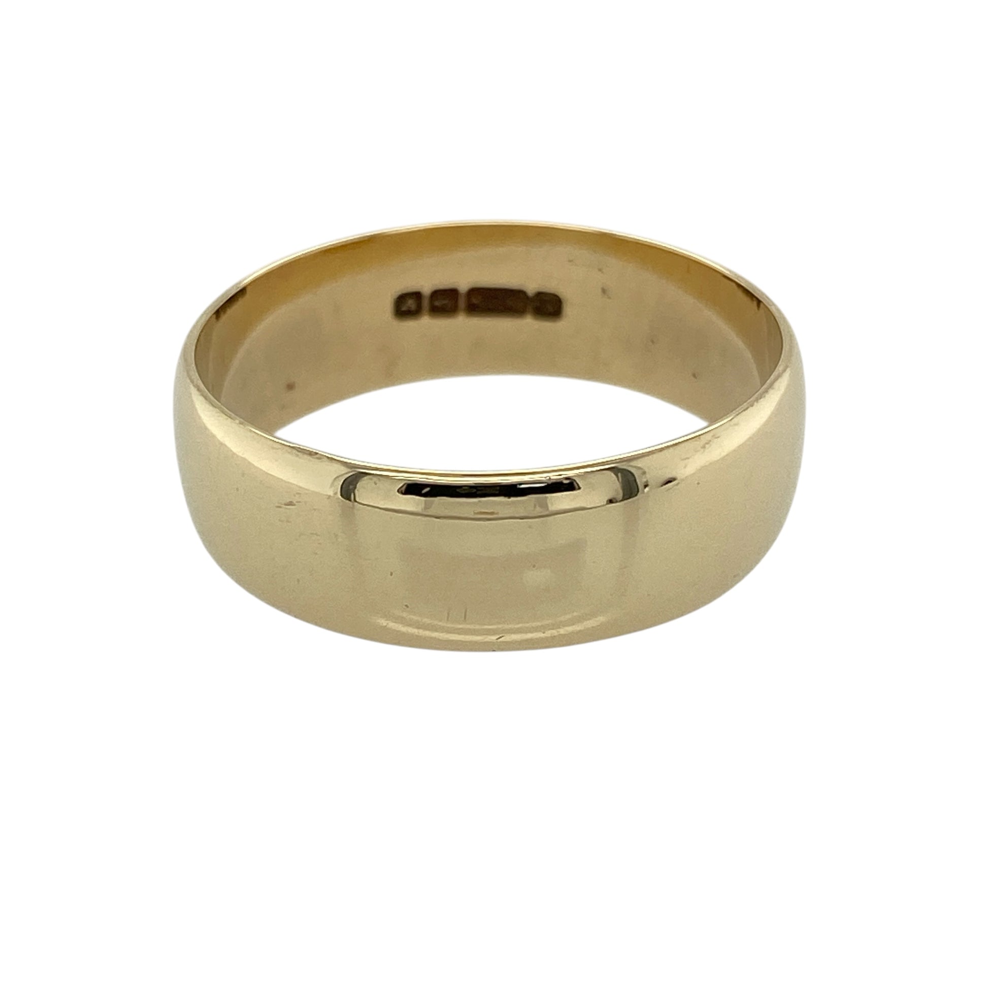 Make a bold statement with this pre-owned 9ct yellow gold 7mm wedding band ring—an impressive and timeless piece designed for everyday wear.

Design: The ring features a wide 7mm band, offering a strong and classic profile with a smooth, polished finish that enhances its bold appearance.
Material: Made from 9-carat yellow gold, the polished surface highlights the rich, warm tone of the metal while maintaining a clean and traditional look.