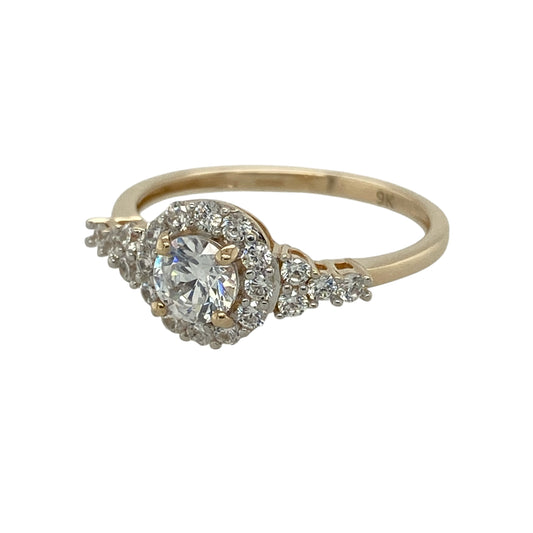 Add elegant sparkle and classic style to your collection with this pre-owned 9ct yellow gold cubic zirconia cluster ring—an eye-catching piece with timeless appeal.

Design: The ring features a cluster front measuring approximately 9mm in height, set with sparkling cubic zirconia that create a bright and striking focal point.
Material: Made from 9-carat yellow gold, the polished finish enhances the warmth of the metal while complementing the brilliance of the stones.
