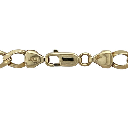 Make a bold and timeless statement with this pre-owned 9ct yellow gold curb chain—an eye-catching piece with strong presence and classic appeal.

Design: The chain features a 6mm wide curb link design, creating a structured and confident look with smooth, interlocking links that sit comfortably against the skin.
Material: Made from 9-carat yellow gold, the polished finish enhances the rich, warm tone of the metal while adding a bright, reflective shine.