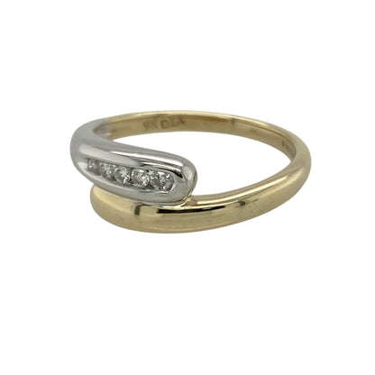 Add modern elegance and subtle sparkle to your collection with this pre-owned 9ct yellow and white gold diamond set wrap over band ring—an effortlessly stylish piece with timeless appeal.

Design: The ring features a wrap-over band design measuring approximately 6mm at the front, with flowing lines that create a graceful and contemporary look, accented with sparkling diamonds.