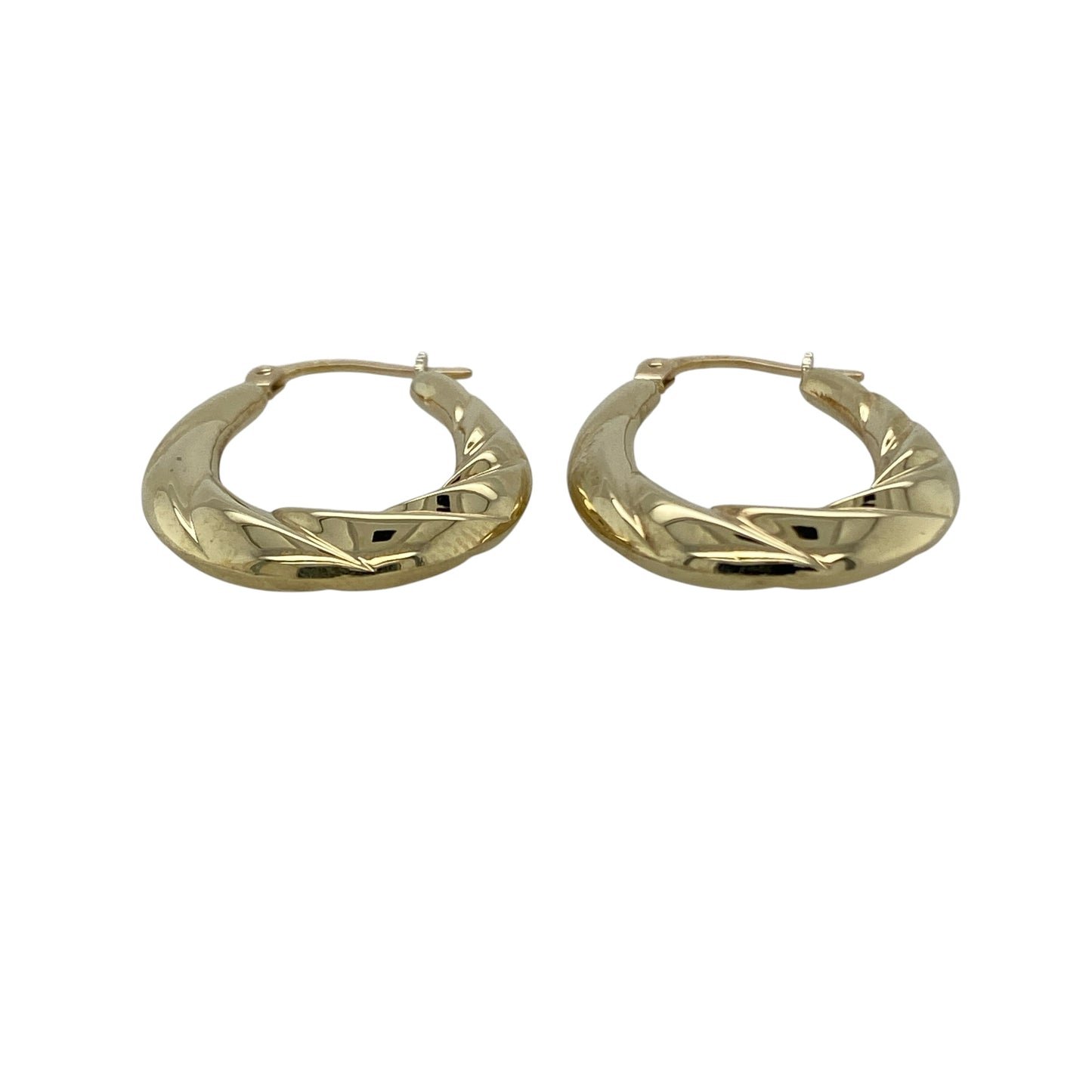 Bring timeless style with a contemporary twist to your collection with these pre-owned 9ct yellow gold twisted oval creole earrings, offering elegant shape and subtle texture—perfect for everyday wear or effortless styling.

Design: The earrings feature an oval creole shape with a twisted design, adding dimension and visual interest while maintaining a classic hoop-inspired look.