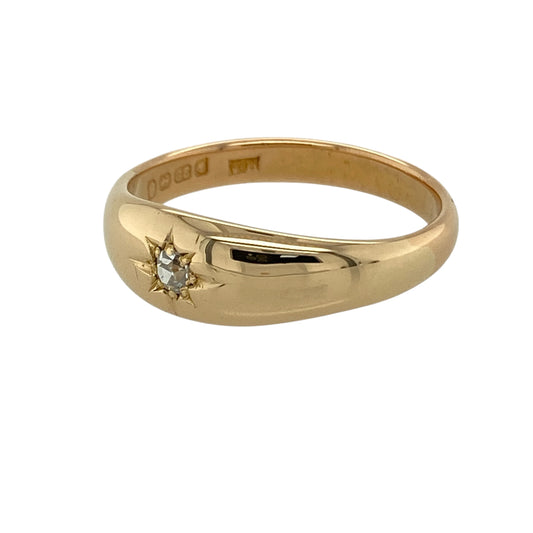 Bring rich colour and understated sparkle to your collection with this pre-owned 22ct yellow gold diamond set band ring, featuring a bold profile and classic appeal—perfect for everyday wear or special occasions.

Design: The ring features a wide band design with a front width of approximately 7mm, highlighted by a single diamond of around 0.10ct, offering a clean and elegant focal point.