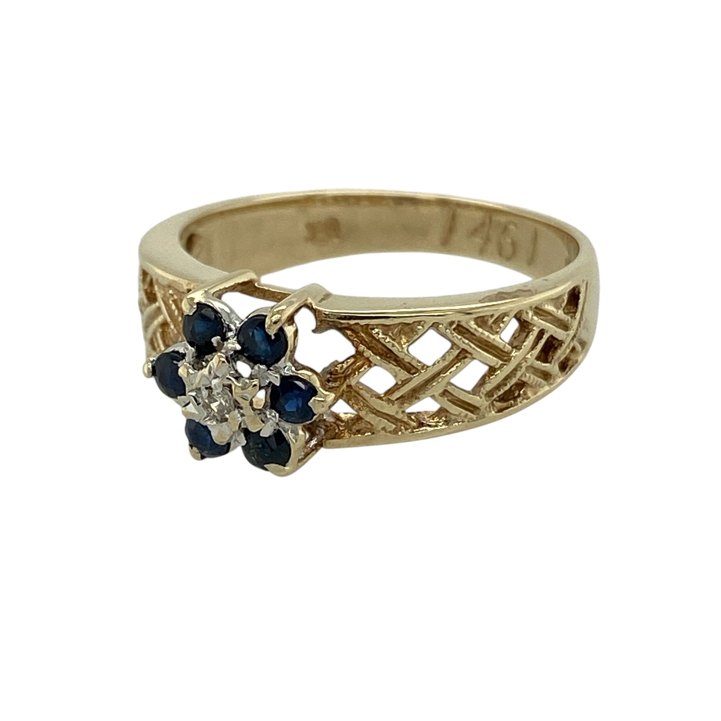 Bring timeless elegance and rich colour to your collection with this pre-owned 9ct yellow gold diamond and sapphire cluster ring, featuring classic gemstones and intricate detailing—perfect for both everyday wear and special occasions.

Design: The ring showcases a cluster-style front measuring approximately 7mm in height, set with deep blue sapphires and sparkling diamonds, complemented by open basket style shoulders that add detail and dimension.