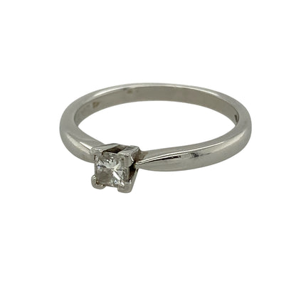 Bring sleek elegance and timeless sparkle to your collection with this pre-owned platinum diamond solitaire ring, featuring a contemporary cut and refined finish—perfect for special occasions or everyday luxury.

Design: The ring showcases a princess-cut diamond of approximately 0.25ct at the centre, offering clean lines and a modern square silhouette within a classic solitaire style.