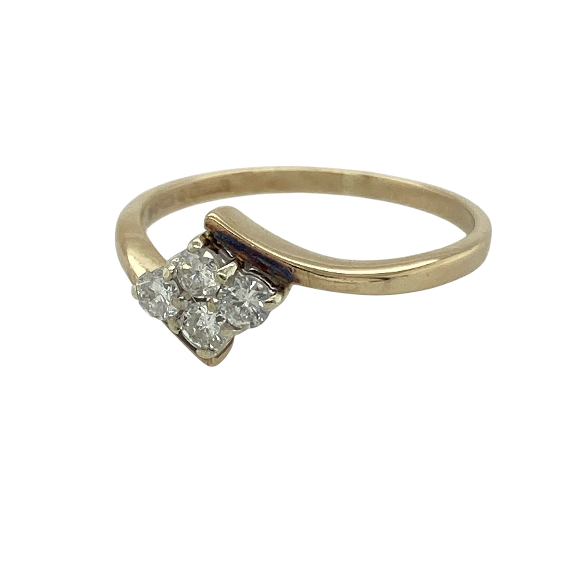 Bring delicate sparkle and modern styling to your collection with this pre-owned 9ct yellow gold diamond four stone cluster wrap over ring, featuring a graceful design with eye-catching detail—perfect for everyday wear or special occasions.

Design: The ring features a wrap over style with a four stone diamond cluster at the front, measuring approximately 7mm in height, creating a compact yet sparkling focal point.
