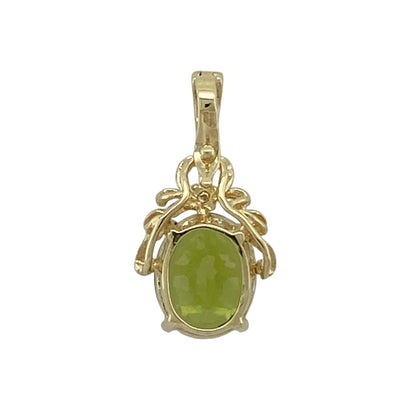 Bring fresh colour and elegant sparkle to your collection with this pre-owned 9ct yellow gold diamond and peridot set pendant, featuring a vibrant centre stone and timeless appeal—perfect for everyday wear or special occasions.

Design: The pendant showcases a 10mm by 8mm oval peridot at the centre, complemented by sparkling diamond accents that enhance its bright green hue and create a balanced, eye-catching look.