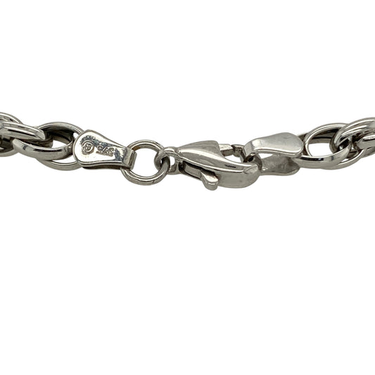 Bring classic texture and refined style to your collection with this pre-owned 9ct white gold Prince of Wales bracelet, featuring a distinctive link design with timeless appeal—perfect for everyday wear or layering.

Design: The bracelet features a traditional Prince of Wales link pattern with a width of approximately 4mm, offering a structured and eye-catching look with intricate detail.