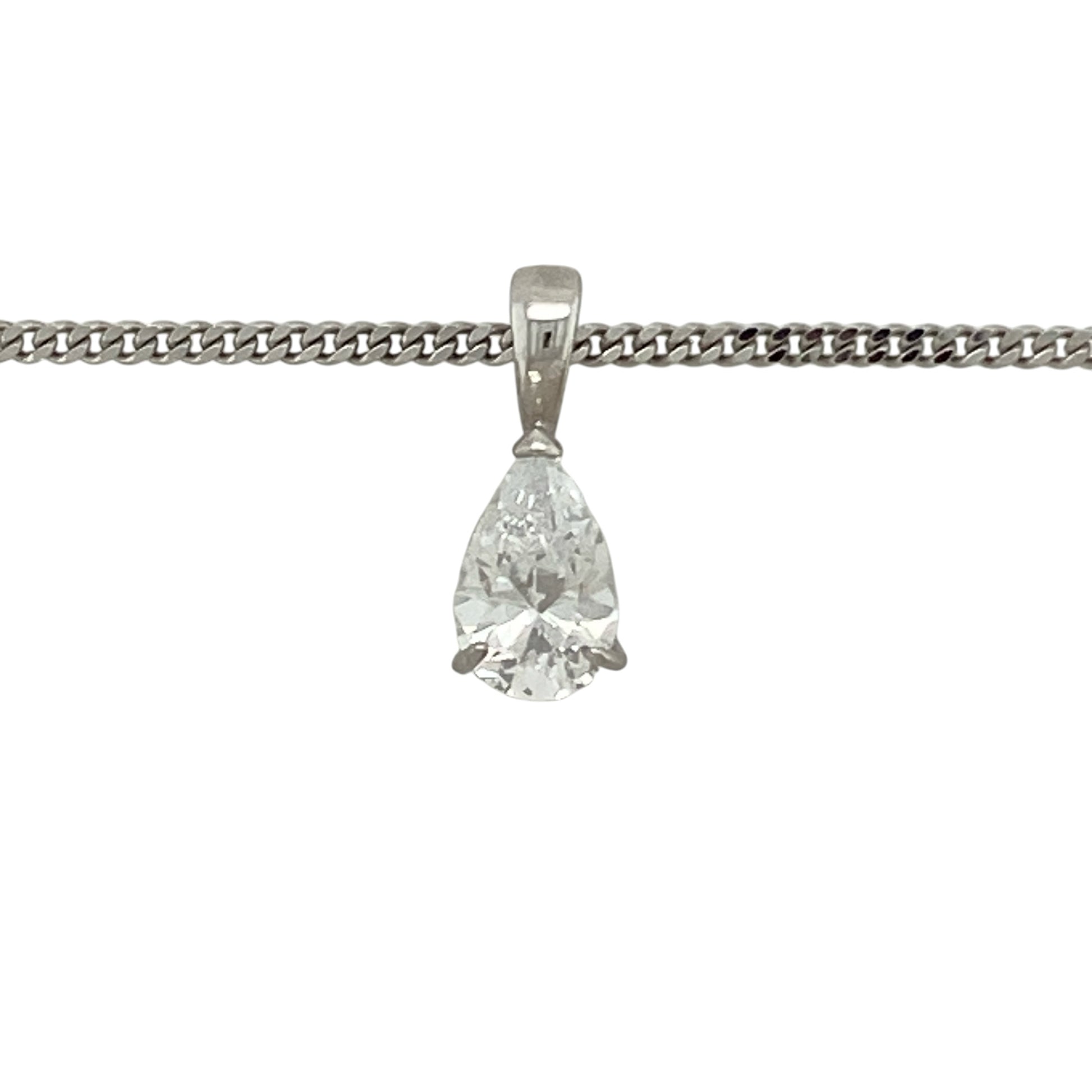 Bring elegant sparkle and timeless style to your collection with this pre-owned 9ct white gold cubic zirconia teardrop pendant necklace, featuring a graceful design with refined brilliance—perfect for everyday wear or special occasions.

Design: The pendant features an 8mm by 5mm teardrop-shaped cubic zirconia, with an overall length of approximately 1.4cm including the bail, suspended from an 18" curb chain for a classic and balanced look.