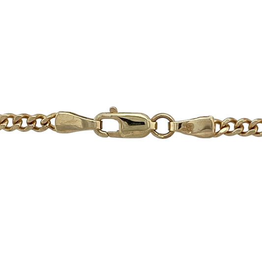Bring classic style and versatile length to your collection with this pre-owned 9ct yellow gold curb chain, featuring a timeless design with everyday appeal—perfect for wearing alone or layering.

Design: The chain features a traditional curb link pattern with a width of approximately 2mm, offering a neat and balanced look that sits comfortably against the neckline.
Material: Made from 9-carat yellow gold, the polished finish enhances the smooth links, creating a warm and classic appearance.