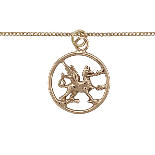Bring heritage charm and elegant contrast to your collection with this pre-owned 9ct yellow and rose gold Welsh dragon round pendant necklace, featuring a symbolic design with timeless appeal—perfect for everyday wear or a meaningful gift.

Design: The pendant showcases a round form with a detailed Welsh dragon motif, measuring approximately 2.5cm in length including the bail, suspended from an 18" curb chain for a classic finish.