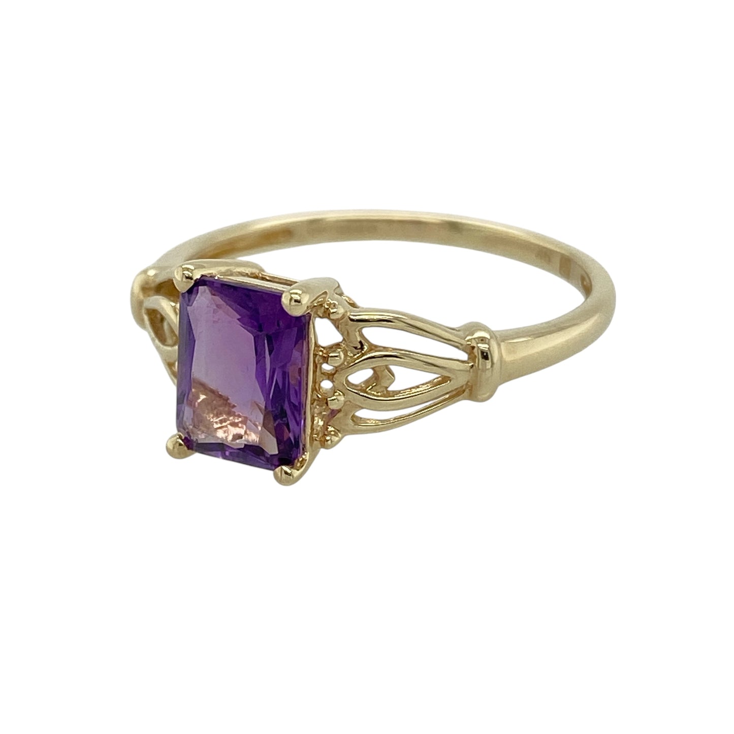 Bring rich colour and elegant detail to your collection with this pre-owned 9ct yellow gold amethyst set ring, featuring a striking centre stone and decorative shoulders—perfect for everyday wear or special occasions.

Design: The ring showcases an 8mm by 6mm rectangular amethyst at the centre, complemented by open patterned shoulders that add texture and a refined, eye-catching finish.