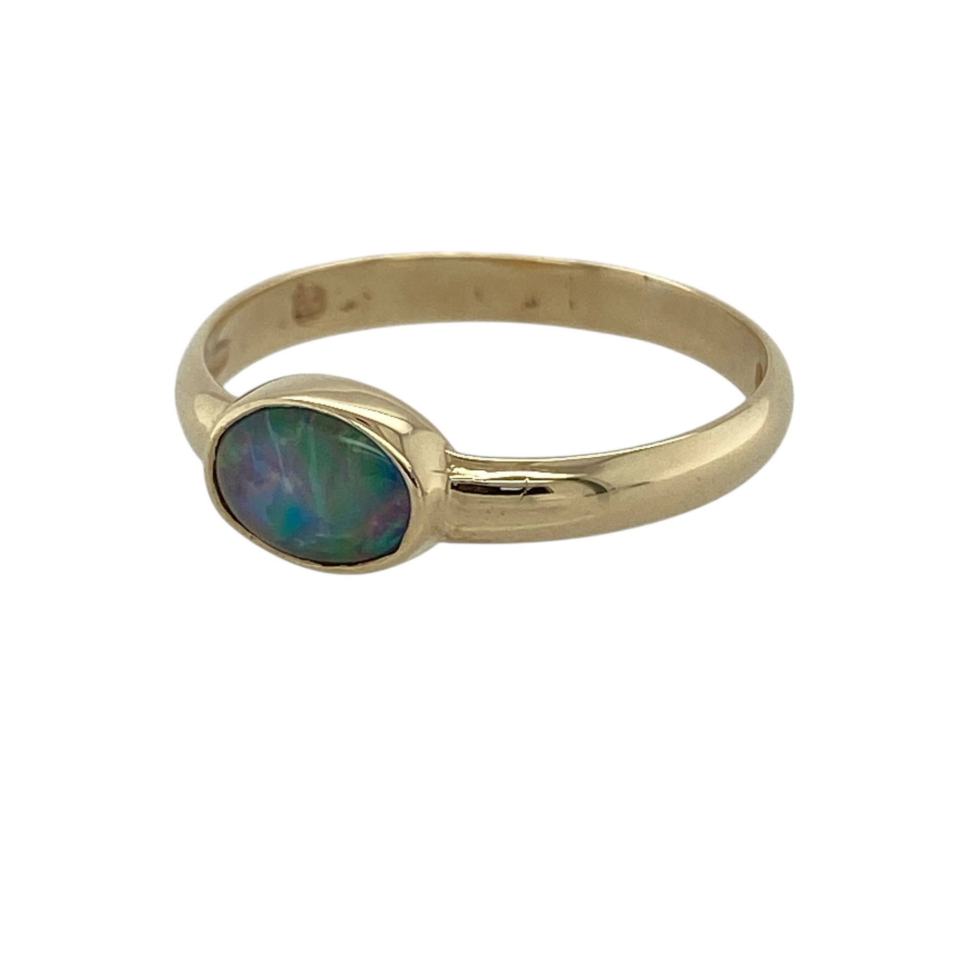 Bring soft iridescence and timeless elegance to your collection with this pre-owned 9ct yellow gold opalique oval solitaire ring, featuring a delicate design with subtle colour—perfect for everyday wear or special occasions.

Design: The ring showcases a 7mm by 5mm oval opalique stone at the centre, creating a smooth and luminous focal point in a classic solitaire style.