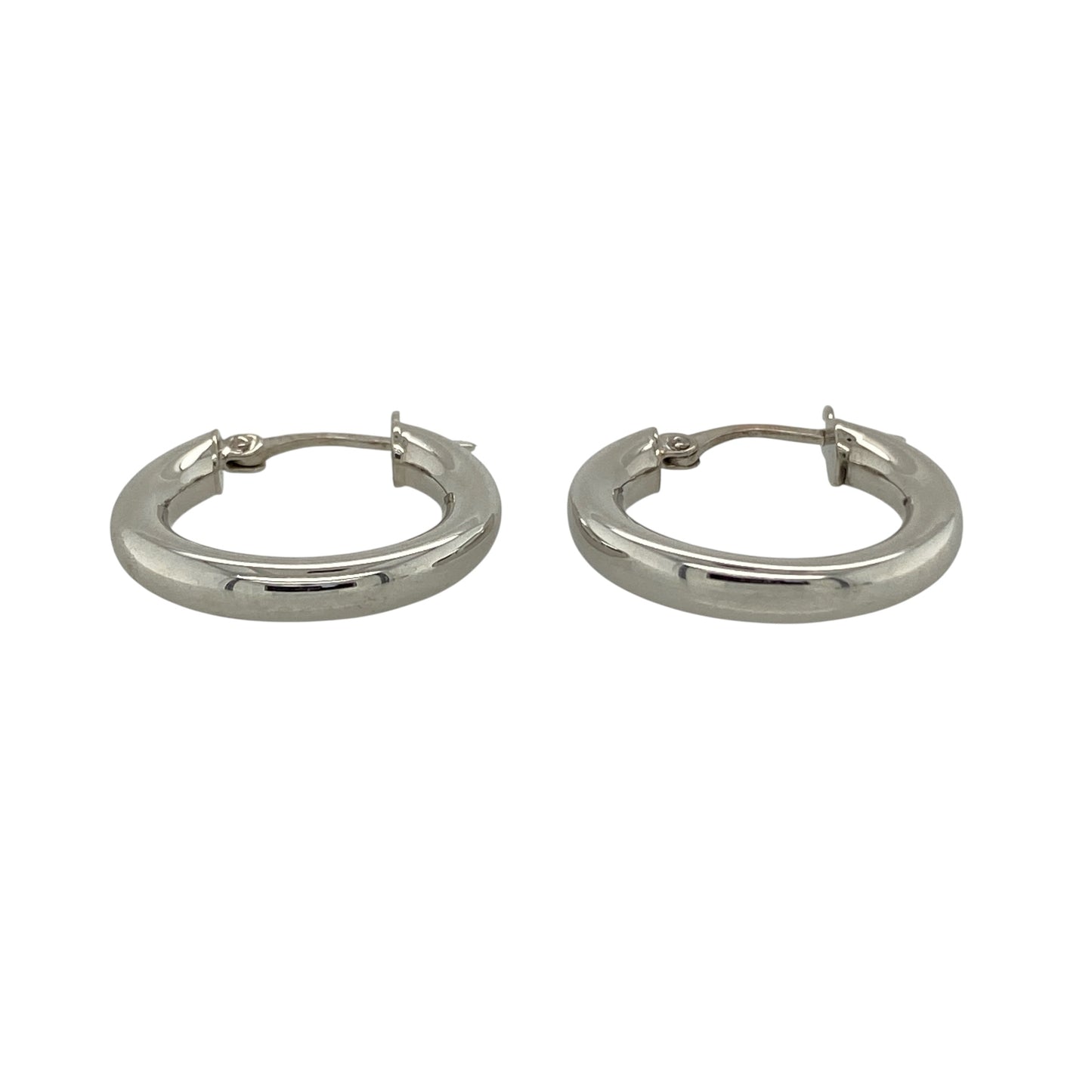 Bring clean simplicity and timeless elegance to your collection with these pre-owned 9ct white gold plain hoop creole earrings, featuring a classic design with everyday versatility—perfect for any occasion.

Design: The earrings feature a traditional hoop creole style with smooth, plain surfaces, creating a sleek and understated look that never goes out of fashion.
Material: Made from 9-carat white gold, the polished finish enhances the clean lines while offering a bright and contemporary appearance.