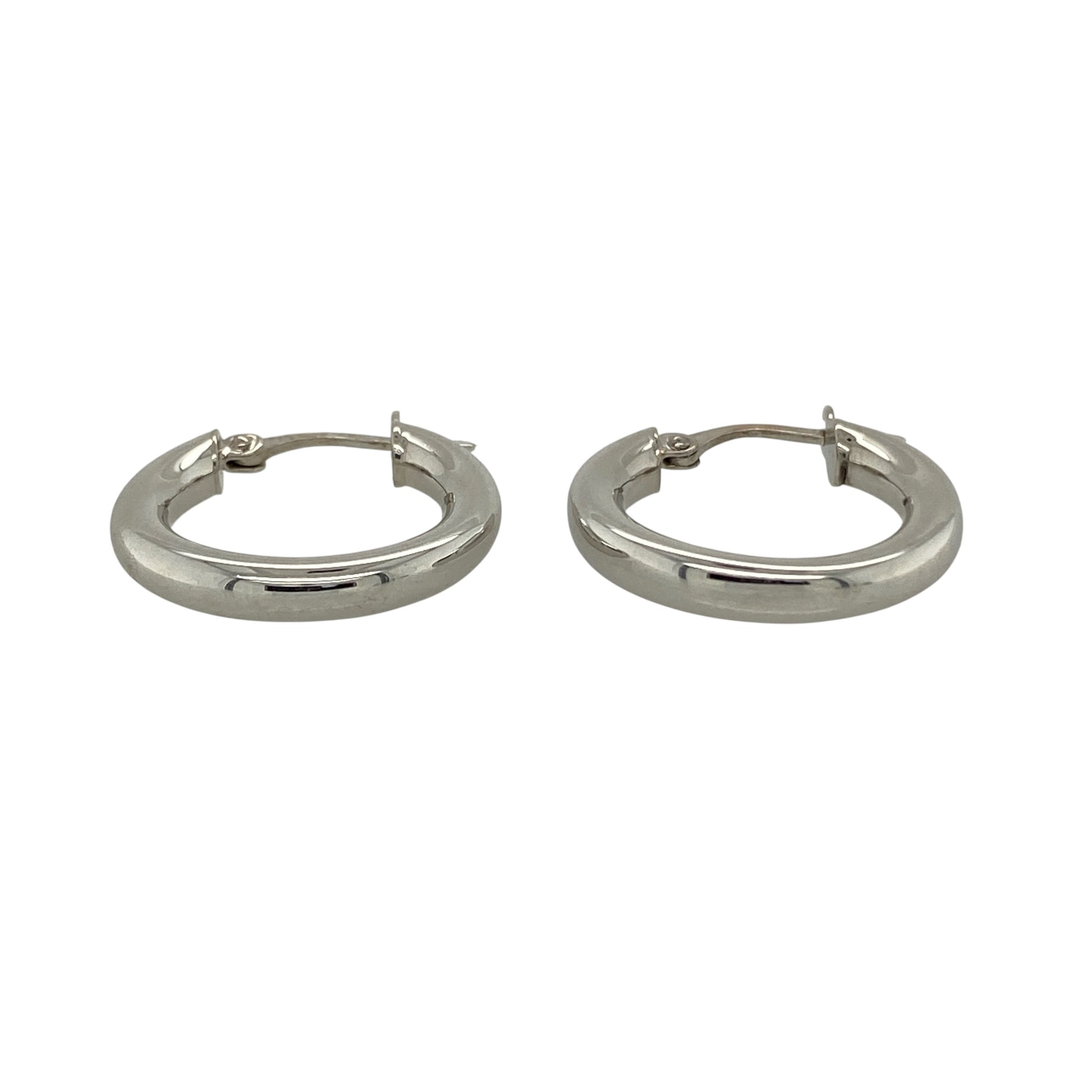 Bring clean simplicity and timeless elegance to your collection with these pre-owned 9ct white gold plain hoop creole earrings, featuring a classic design with everyday versatility—perfect for any occasion.

Design: The earrings feature a traditional hoop creole style with smooth, plain surfaces, creating a sleek and understated look that never goes out of fashion.
Material: Made from 9-carat white gold, the polished finish enhances the clean lines while offering a bright and contemporary appearance.