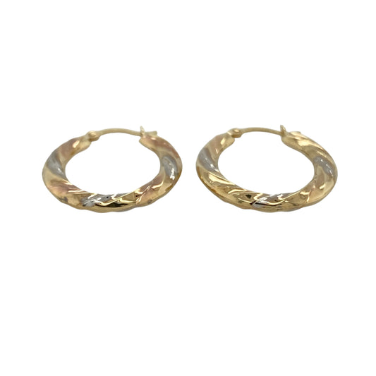 Bring subtle colour and elegant texture to your collection with these pre-owned 9ct yellow, rose and white gold twisted oval creole earrings, featuring a delicate tri-colour design with timeless appeal—perfect for everyday wear.

Design: The earrings feature an oval creole hoop shape with a twisted design, combining three tones of gold to create a soft, eye-catching finish with added dimension.