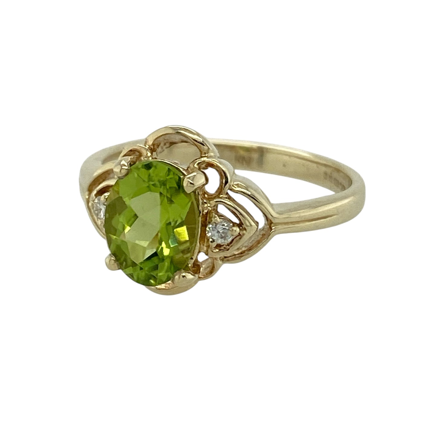 Bring fresh colour and elegant sparkle to your collection with this pre-owned 9ct yellow gold diamond and peridot set ring, featuring a vibrant centre stone and timeless appeal—perfect for everyday wear or special occasions.

Design: The ring showcases an 8mm by 6mm oval peridot at the centre, accented by sparkling diamonds that enhance its vivid green hue and create a balanced, eye-catching look.