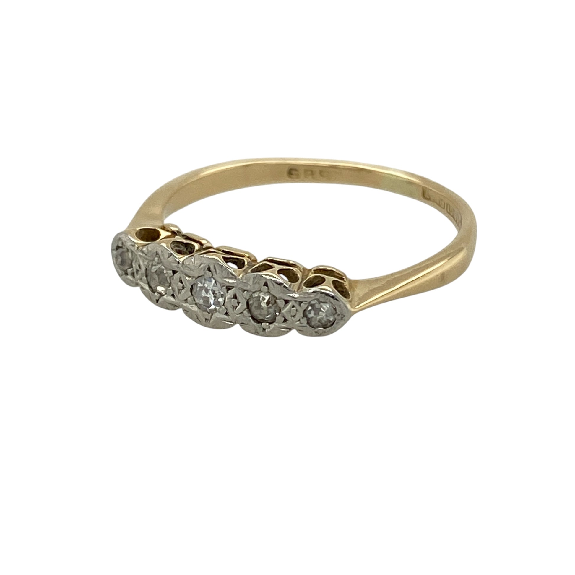 Bring timeless sparkle and classic elegance to your collection with this pre-owned 18ct yellow gold diamond five stone band ring, featuring a refined design with enduring appeal—perfect for everyday wear or special occasions.

Design: The ring features a five stone band design with a front width of approximately 4mm, showcasing a row of sparkling diamonds in a balanced and elegant arrangement.