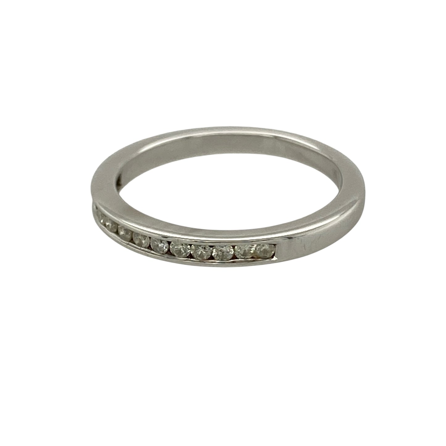 Bring refined sparkle and timeless elegance to your collection with this pre-owned 18ct white gold diamond channel set band ring, featuring a sleek design with classic appeal—perfect for everyday wear or stacking with other rings.

Design: The ring features a slim band style measuring approximately 2mm across the front, set with diamonds in a smooth channel setting for a clean and sophisticated finish.