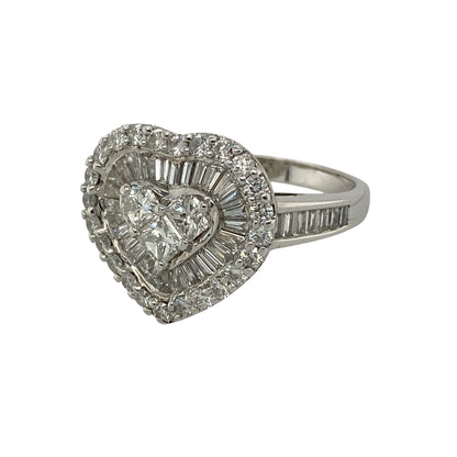 Bring exceptional sparkle and romantic elegance to your collection with this pre-owned 18ct white gold diamond heart cluster ring, featuring a luxurious design with striking brilliance—perfect for special occasions or a meaningful gift.

Design: The ring showcases a heart-shaped cluster design measuring approximately 14mm in height, set with a stunning combination of brilliant, princess, and baguette cut diamonds arranged to form an eye-catching heart motif.