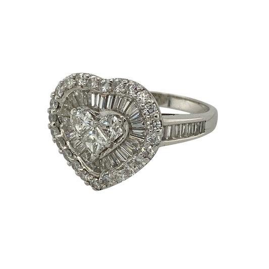 Bring exceptional sparkle and romantic elegance to your collection with this pre-owned 18ct white gold diamond heart cluster ring, featuring a luxurious design with striking brilliance—perfect for special occasions or a meaningful gift.

Design: The ring showcases a heart-shaped cluster design measuring approximately 14mm in height, set with a stunning combination of brilliant, princess, and baguette cut diamonds arranged to form an eye-catching heart motif.