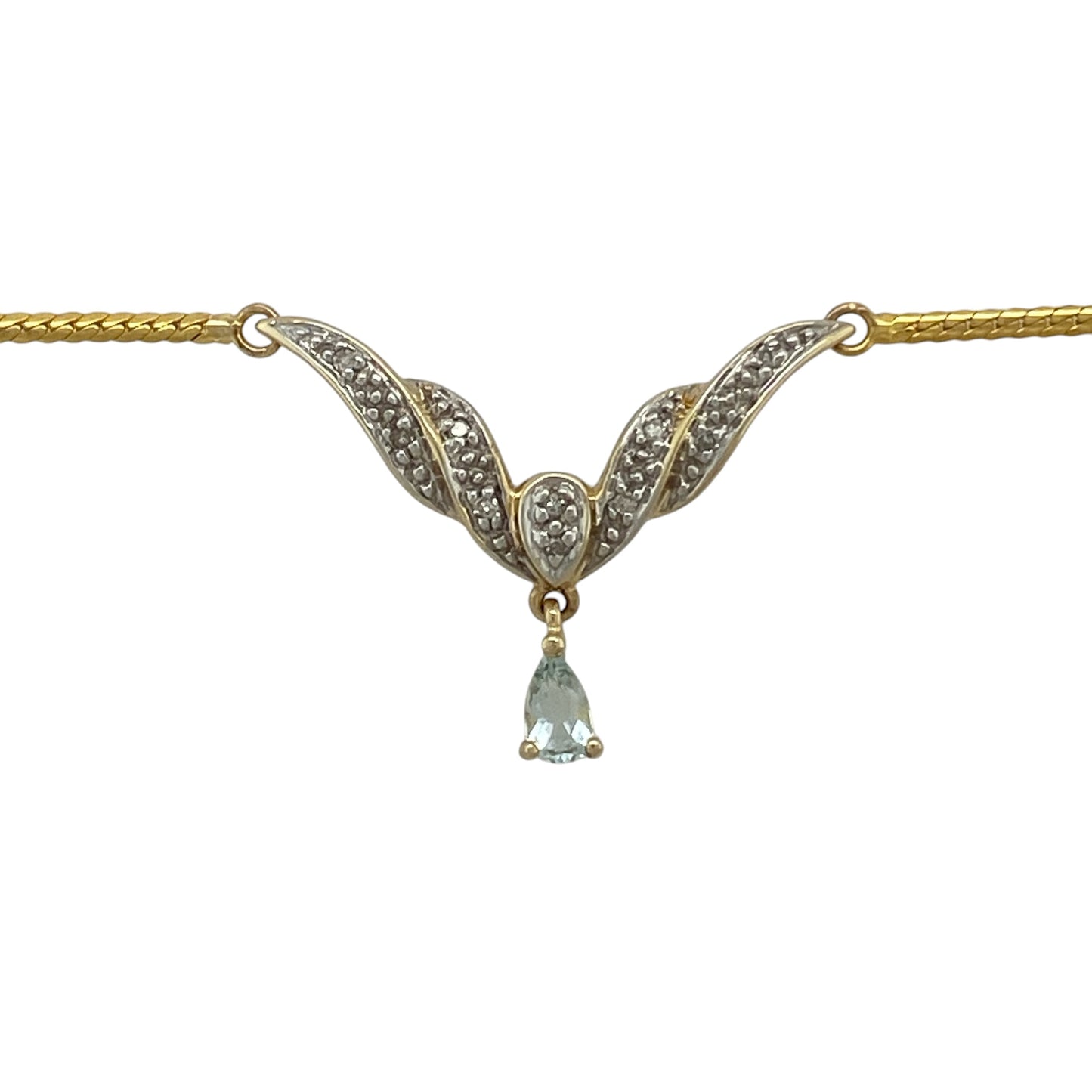 Bring elegant colour and graceful styling to your collection with this pre-owned 9ct yellow and white gold diamond and aquamarine-coloured blue stone necklace, featuring a sophisticated Y-shaped design with delicate sparkle—perfect for special occasions or refined everyday wear.

Design: The necklace features a Y-shaped drop design set with sparkling diamonds and a teardrop-shaped aquamarine-coloured blue stone measuring approximately 5mm by 3mm, creating a graceful and eye-catching focal point.