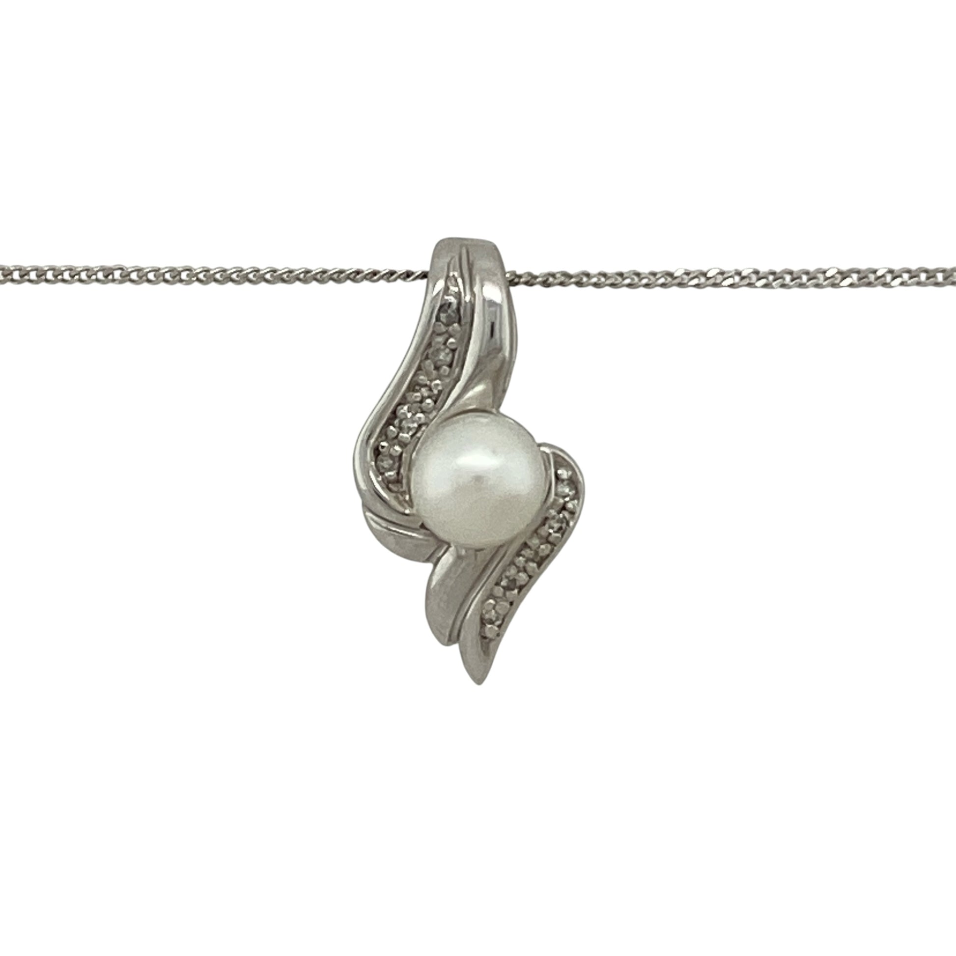 Bring timeless elegance and graceful detail to your collection with this pre-owned 9ct white gold diamond and pearl twist pendant necklace, featuring a classic design with refined sparkle—perfect for everyday wear or special occasions.

Design: The pendant features a flowing twist design measuring approximately 2cm in length, set with sparkling diamonds and centred with a 6mm pearl, suspended from an 18" curb chain for a balanced and elegant finish.