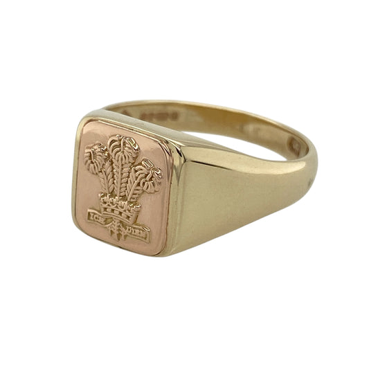 Bring heritage-inspired style and bold character to your collection with this pre-owned 9ct yellow and rose gold Clogau Three Feathers signet ring, featuring a striking design with timeless appeal—perfect for everyday wear or a standout statement piece.

Design: The ring showcases a rectangular signet-style front measuring approximately 12mm in height, detailed with the iconic Three Feathers motif for a bold and recognisable finish.
