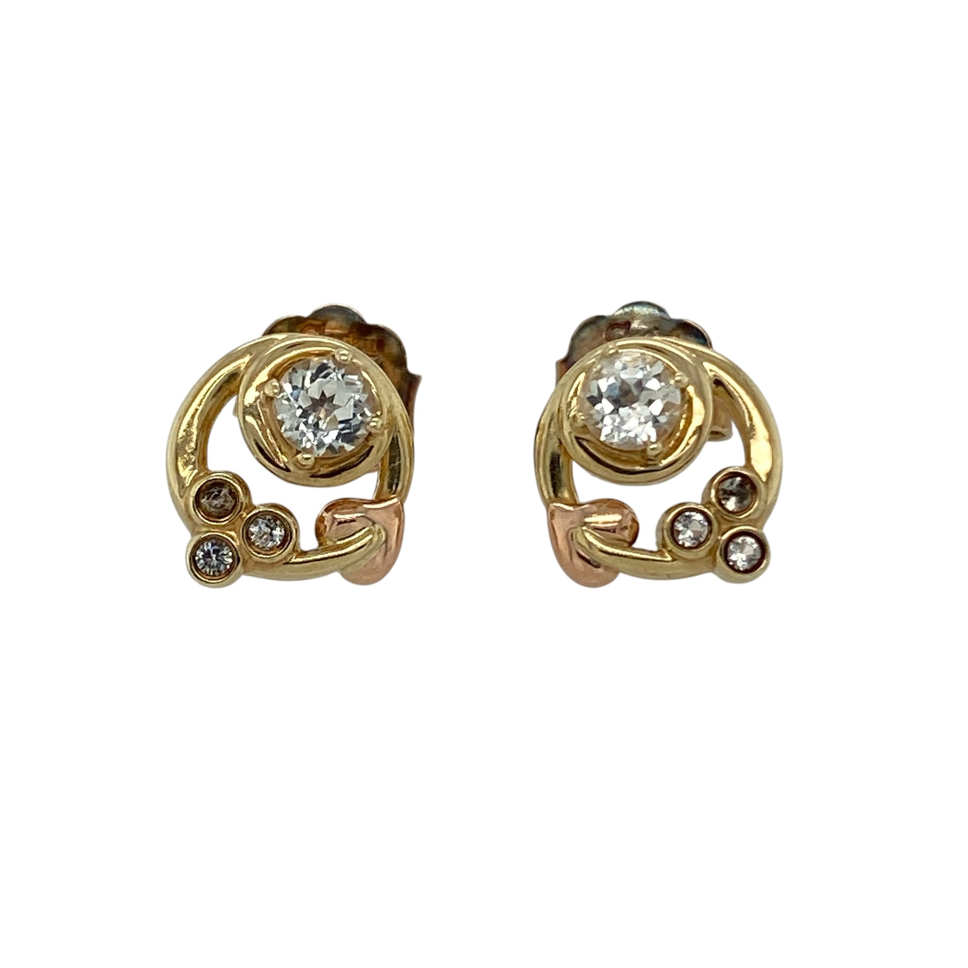 Bring meaningful symbolism and elegant sparkle to your collection with these pre-owned 9ct yellow and rose gold Clogau Tree of Life Origin stud earrings, featuring a refined design with timeless appeal—perfect for everyday wear or special occasions.

Design: The earrings showcase the iconic Tree of Life Origin design in a round stud style, accented with sparkling white topaz stones, with the largest stones measuring approximately 3mm in diameter.