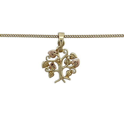 Bring meaningful symbolism and timeless elegance to your collection with this pre-owned 9ct yellow and rose gold Clogau Tree of Life pendant necklace, featuring a graceful design with versatile wearability—perfect for everyday styling or a thoughtful gift.

Design: The pendant showcases the iconic Tree of Life motif measuring approximately 1.9cm in length including the bail, suspended from an adjustable Clogau curb chain that can be worn at 18", 20", or 22" lengths for versatile styling.