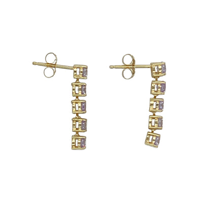 Bring soft colour and elegant simplicity to your collection with these pre-owned 14ct yellow gold lavender-coloured purple stone bar stud earrings, featuring a modern design with delicate sparkle—perfect for everyday wear or subtle styling.

Design: The earrings feature a sleek bar-style design set with five lavender-coloured purple stones in each stud, each measuring approximately 3mm in diameter, creating a neat and eye-catching arrangement.