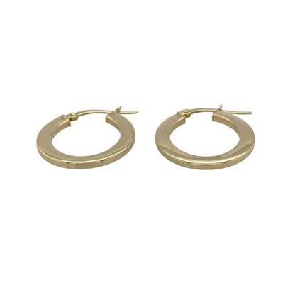 Bring classic simplicity and everyday elegance to your collection with these pre-owned 9ct yellow gold plain flat oval creole earrings, featuring a timeless design with versatile appeal—perfect for any occasion.

Design: The earrings feature a flat oval creole hoop shape with a smooth plain finish, creating a sleek and understated look that complements any style.