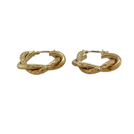 Bring classic elegance and eye-catching texture to your collection with these pre-owned 9ct yellow gold twisted patterned hoop creole earrings, featuring a timeless design with stylish detail—perfect for everyday wear or effortless styling.

Design: The earrings feature a traditional hoop creole shape with a twisted patterned finish, measuring approximately 24mm in diameter for a balanced and versatile look.