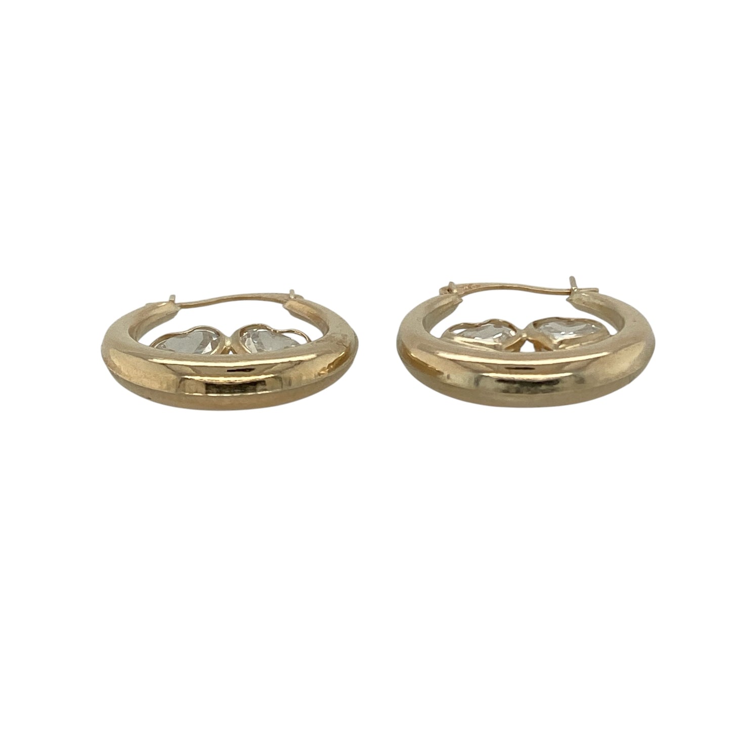 Bring romantic charm and sparkling detail to your collection with these pre-owned 9ct yellow gold cubic zirconia double heart hoop creole earrings, featuring a playful design with timeless appeal—perfect for everyday wear or a thoughtful gift.

Design: The earrings feature an 18mm diameter hoop creole style adorned with a double heart motif, accented with sparkling cubic zirconia for an elegant and eye-catching finish.