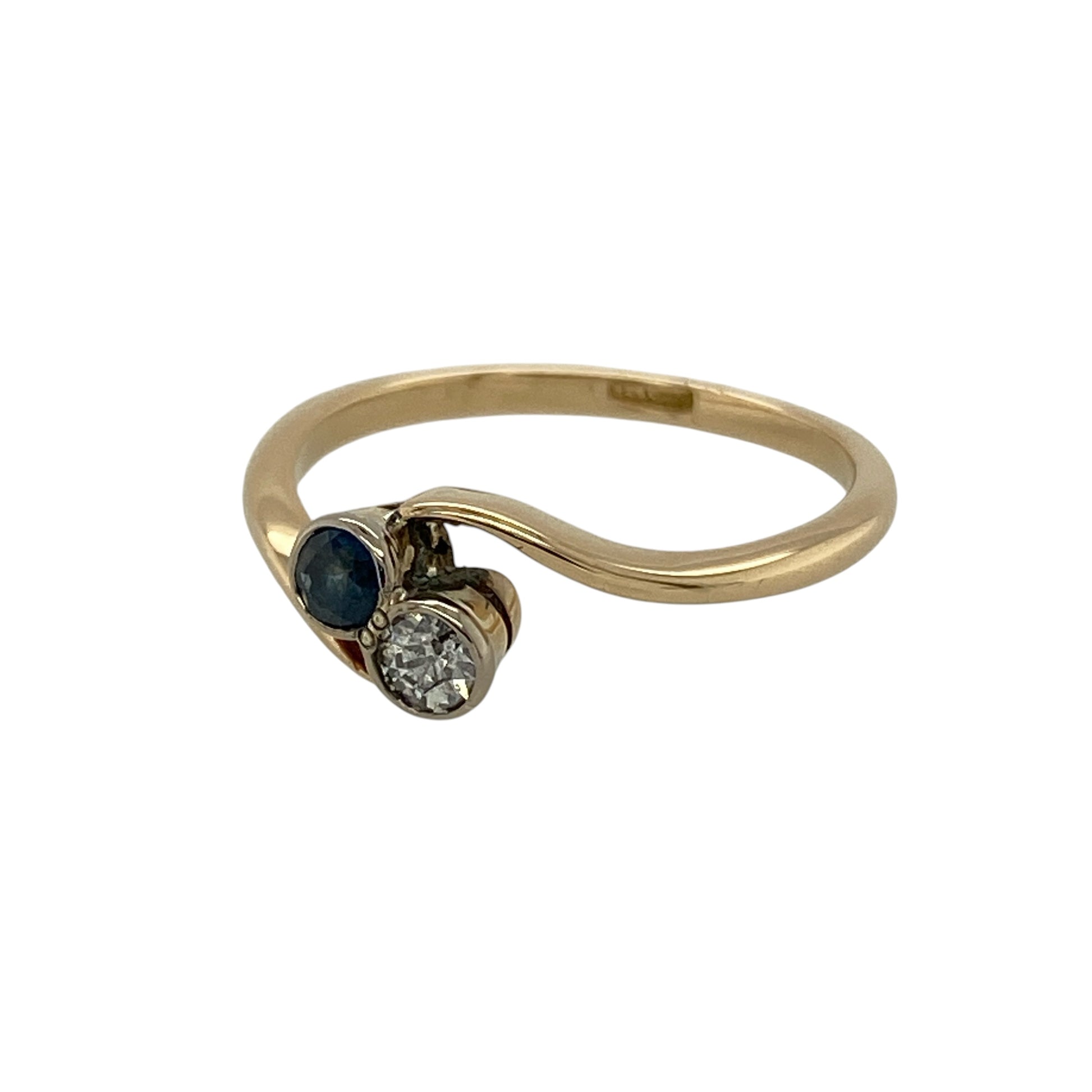 Bring timeless elegance and graceful styling to your collection with this pre-owned 9ct yellow gold diamond and sapphire twist ring, featuring a delicate design with classic appeal—perfect for everyday wear or special occasions.

Design: The ring showcases a 3mm round sapphire within a flowing twist design, accented with sparkling diamonds that add subtle brilliance and movement to the piece.