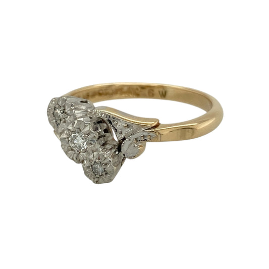 Bring timeless elegance and meaningful sparkle to your collection with this pre-owned 18ct yellow gold and platinum diamond trilogy twist ring, featuring a classic design with refined vintage-inspired detail—perfect for special occasions or everyday sophistication.

Design: The ring showcases a trilogy arrangement of sparkling diamonds within an elegant twist setting, with the front measuring approximately 9mm in height for a graceful and eye-catching appearance.
