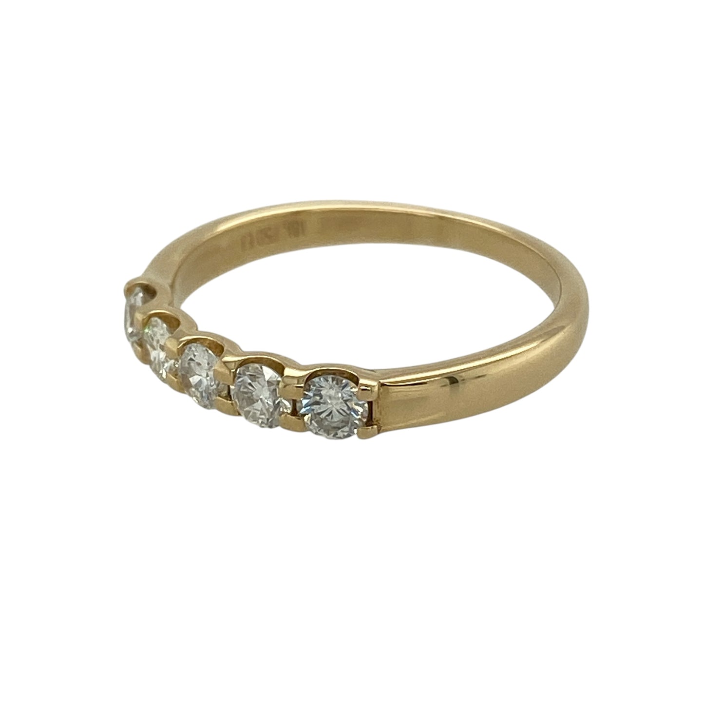 Bring timeless brilliance and refined elegance to your collection with this pre-owned 18ct yellow gold diamond set band ring, featuring a classic five-stone design with exceptional sparkle—perfect for special occasions or everyday sophistication.

Design: The ring features a classic band style set with five brilliant cut diamonds, creating a balanced and eye-catching arrangement with timeless appeal.
