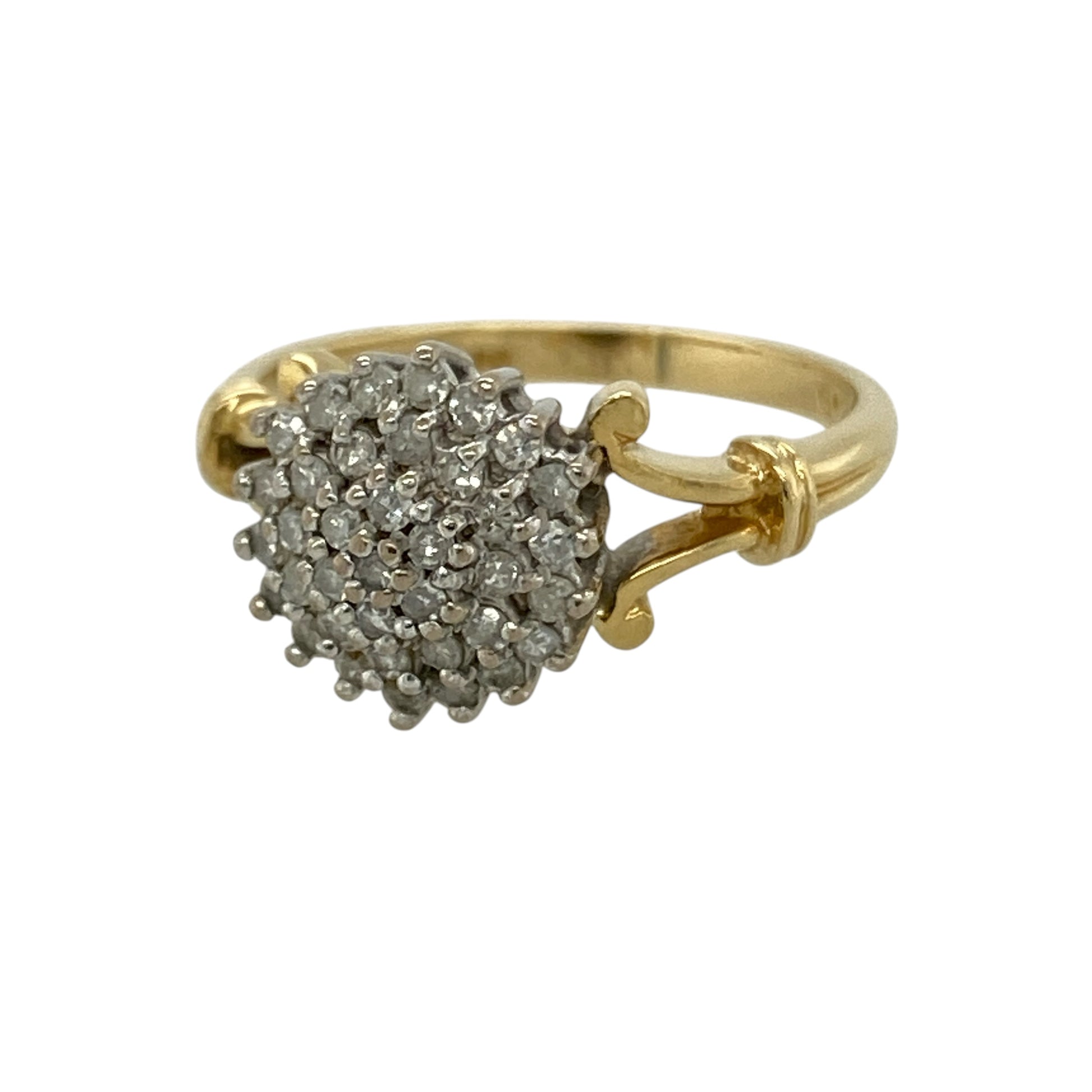 Bring timeless sparkle and elegant styling to your collection with this pre-owned 18ct yellow gold diamond cluster ring, featuring a bold design with refined brilliance—perfect for special occasions or everyday sophistication.

Design: The ring showcases a cluster-style front measuring approximately 10mm in height, set with sparkling diamonds arranged to create a bright and eye-catching focal point.