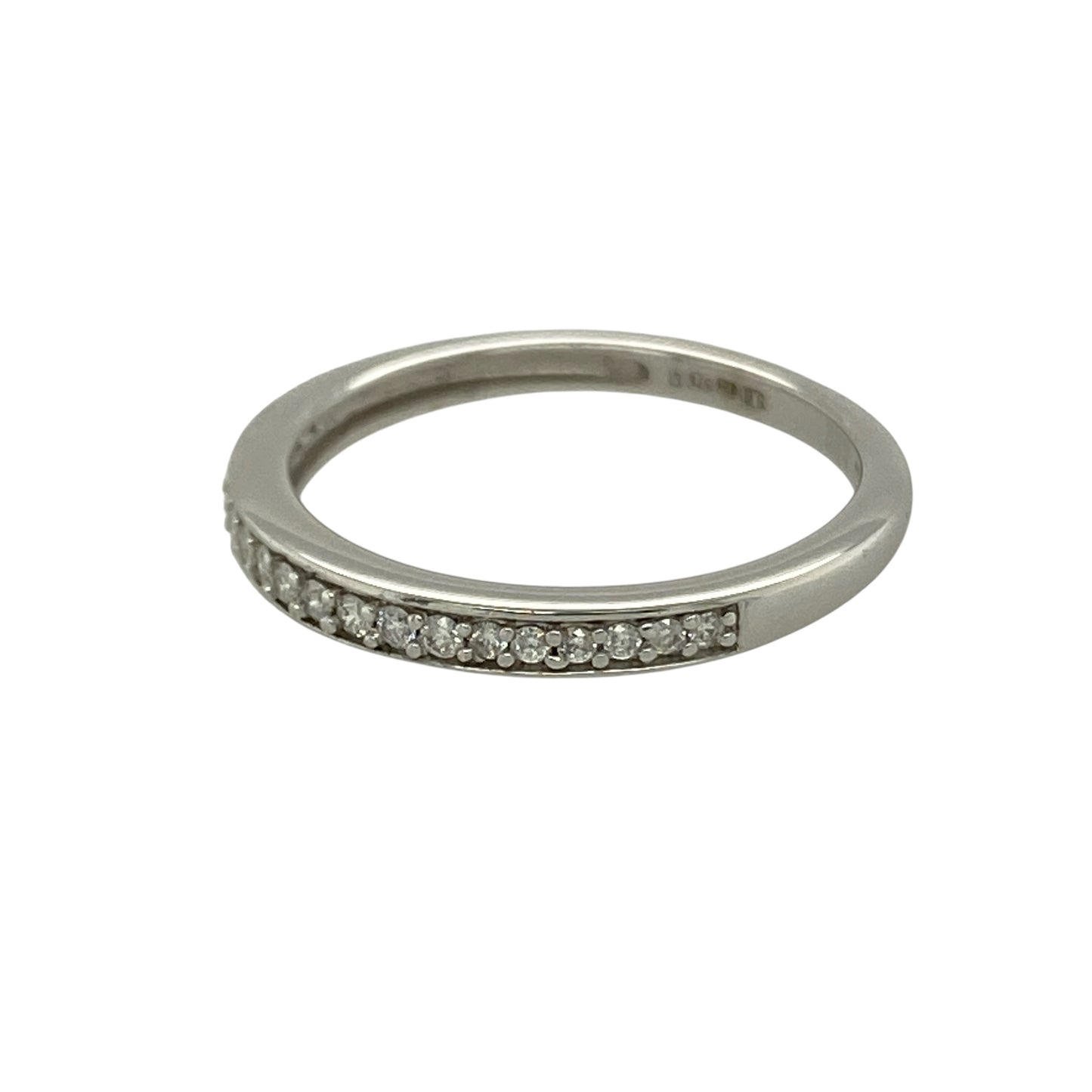 Bring refined sparkle and timeless elegance to your collection with this pre-owned 9ct white gold diamond set band ring, featuring a delicate design with versatile appeal—perfect for everyday wear or stacking with other rings.

Design: The ring features a slim band style measuring approximately 2mm across the front, set with sparkling diamonds that create a subtle yet elegant finish.
