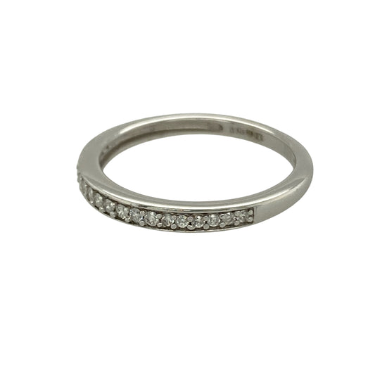 Bring refined sparkle and timeless elegance to your collection with this pre-owned 9ct white gold diamond set band ring, featuring a delicate design with versatile appeal—perfect for everyday wear or stacking with other rings.

Design: The ring features a slim band style measuring approximately 2mm across the front, set with sparkling diamonds that create a subtle yet elegant finish.