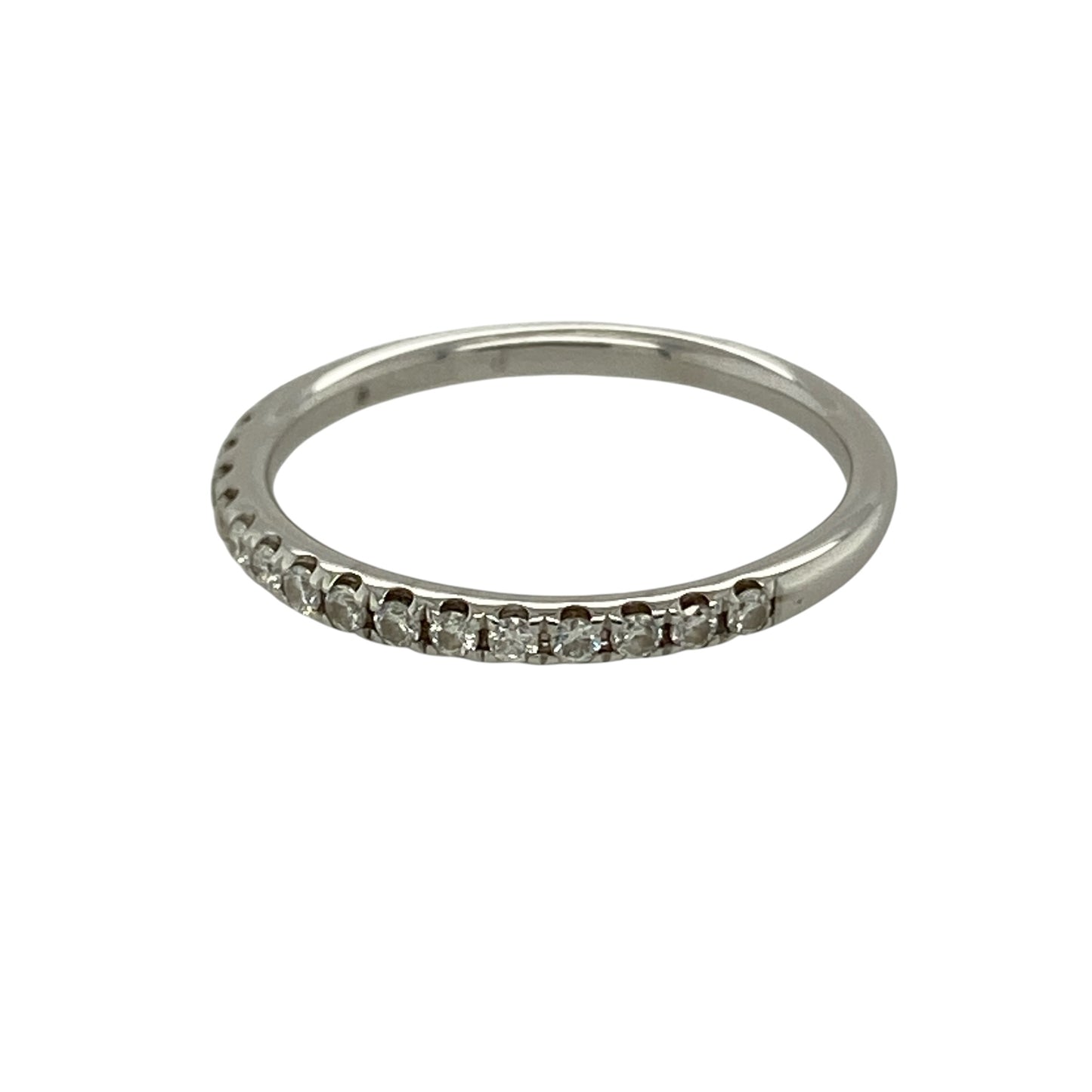 Bring refined sparkle and timeless elegance to your collection with this pre-owned 18ct white gold diamond set band ring, featuring a delicate design with classic appeal—perfect for everyday wear, stacking, or pairing with other rings.

Design: The ring features a slim band style measuring approximately 1.5mm across the front, accented with sparkling diamonds for a subtle and elegant finish.
