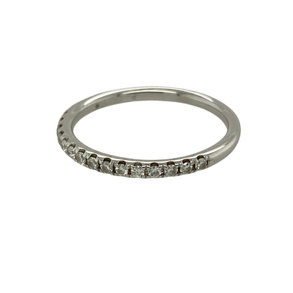 Bring refined sparkle and timeless elegance to your collection with this pre-owned 18ct white gold diamond set band ring, featuring a delicate design with classic appeal—perfect for everyday wear, stacking, or pairing with other rings.

Design: The ring features a slim band style measuring approximately 1.5mm across the front, accented with sparkling diamonds for a subtle and elegant finish.