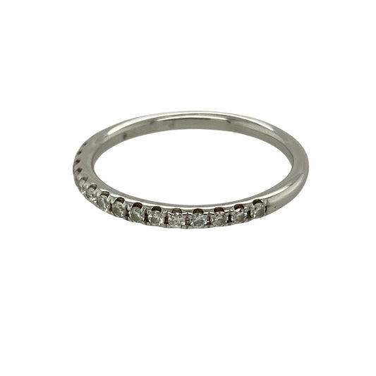 Bring refined sparkle and timeless elegance to your collection with this pre-owned 18ct white gold diamond set band ring, featuring a delicate design with classic appeal—perfect for everyday wear, stacking, or pairing with other rings.

Design: The ring features a slim band style measuring approximately 1.5mm across the front, accented with sparkling diamonds for a subtle and elegant finish.