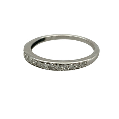 Bring elegant sparkle and timeless simplicity to your collection with this pre-owned 9ct white gold diamond set band ring, featuring a refined design with versatile appeal—perfect for everyday wear or stacking with other rings.

Design: The ring features a slim band style measuring approximately 2mm across the front, set with sparkling diamonds that create a delicate yet eye-catching finish.