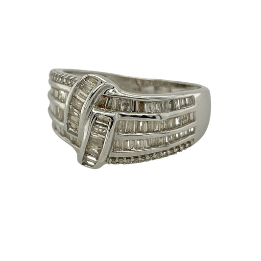 Bring bold elegance and exceptional sparkle to your collection with this pre-owned 9ct white gold diamond wrap over wide band ring, featuring a striking design with luxurious brilliance—perfect for special occasions or standout evening wear.

Design: The ring features a dramatic wrap over style front measuring approximately 12mm in width, set with a stunning combination of baguette and brilliant cut diamonds for a sophisticated and eye-catching finish.