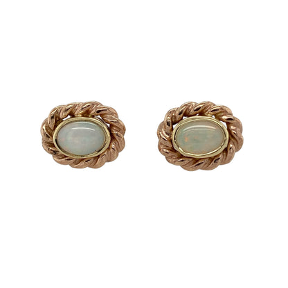 Bring elegant shimmer and timeless Welsh-inspired styling to your collection with these pre-owned 9ct gold opalique set Clogau oval stud earrings, featuring refined detailing with classic appeal—perfect for everyday wear or special occasions.

Design: The earrings feature oval opalique stones measuring approximately 7mm by 5mm each, framed by an intricate rope detail surround that creates a sophisticated and eye-catching finish.