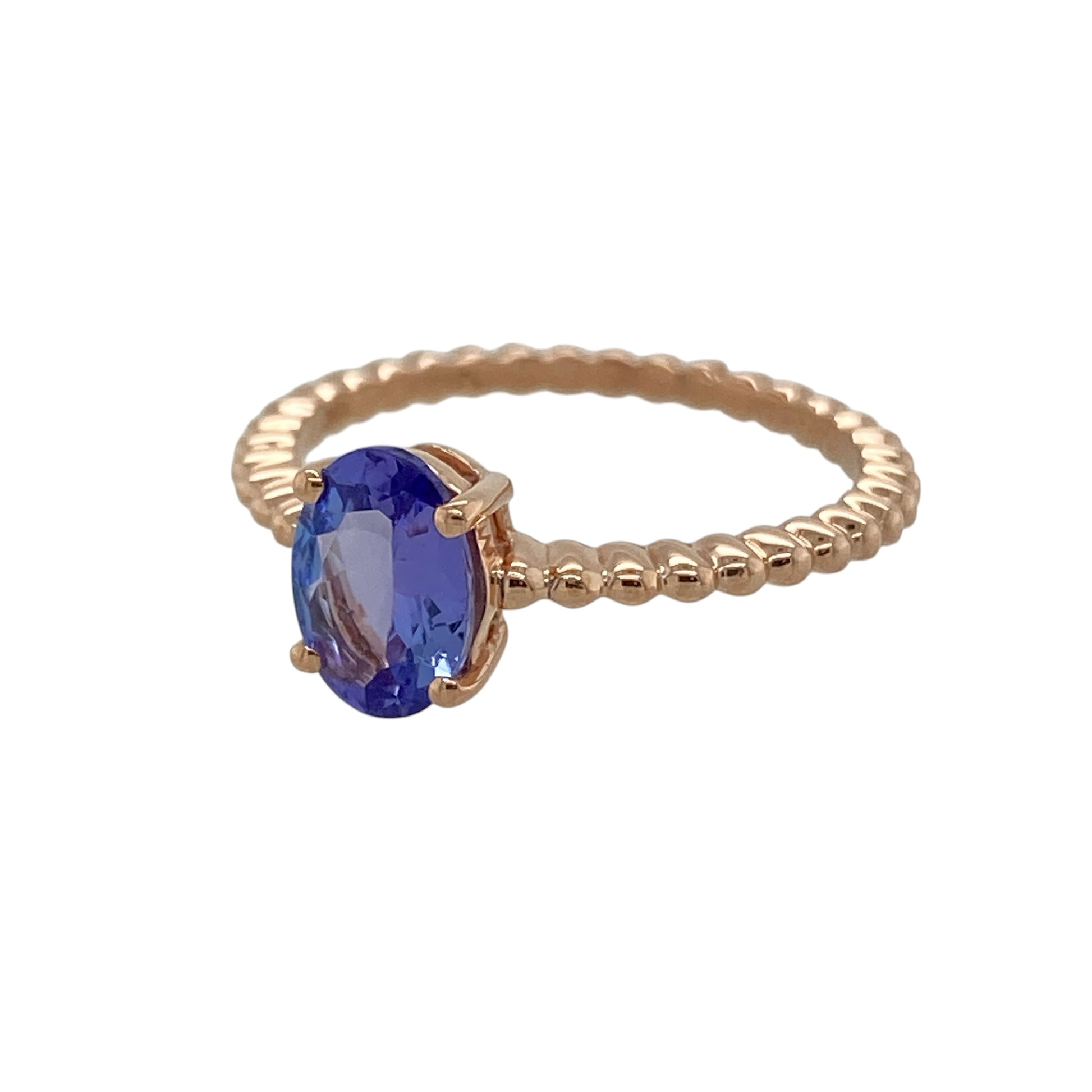 Bring elegant colour and contemporary charm to your collection with this pre-owned 9ct rose gold tanzanite solitaire ring, featuring a graceful design with refined detail—perfect for everyday wear or special occasions.

Design: The ring showcases a 7mm by 5mm oval tanzanite in a classic solitaire setting, complemented by a distinctive bubble-style band that adds texture and modern character.